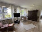 Wohnzimmer - Vielseitiges Wohn- und Geschäftshaus im Herzen der Stadt