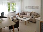 Wohnzimmer - Vielseitiges Wohn- und Geschäftshaus im Herzen der Stadt