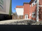 PKW-Plätze - Vielseitiges Wohn- und Geschäftshaus im Herzen der Stadt