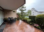 Terrasse - Renovierte Erdgeschosswohnung mit überdachter Terrasse und Garage